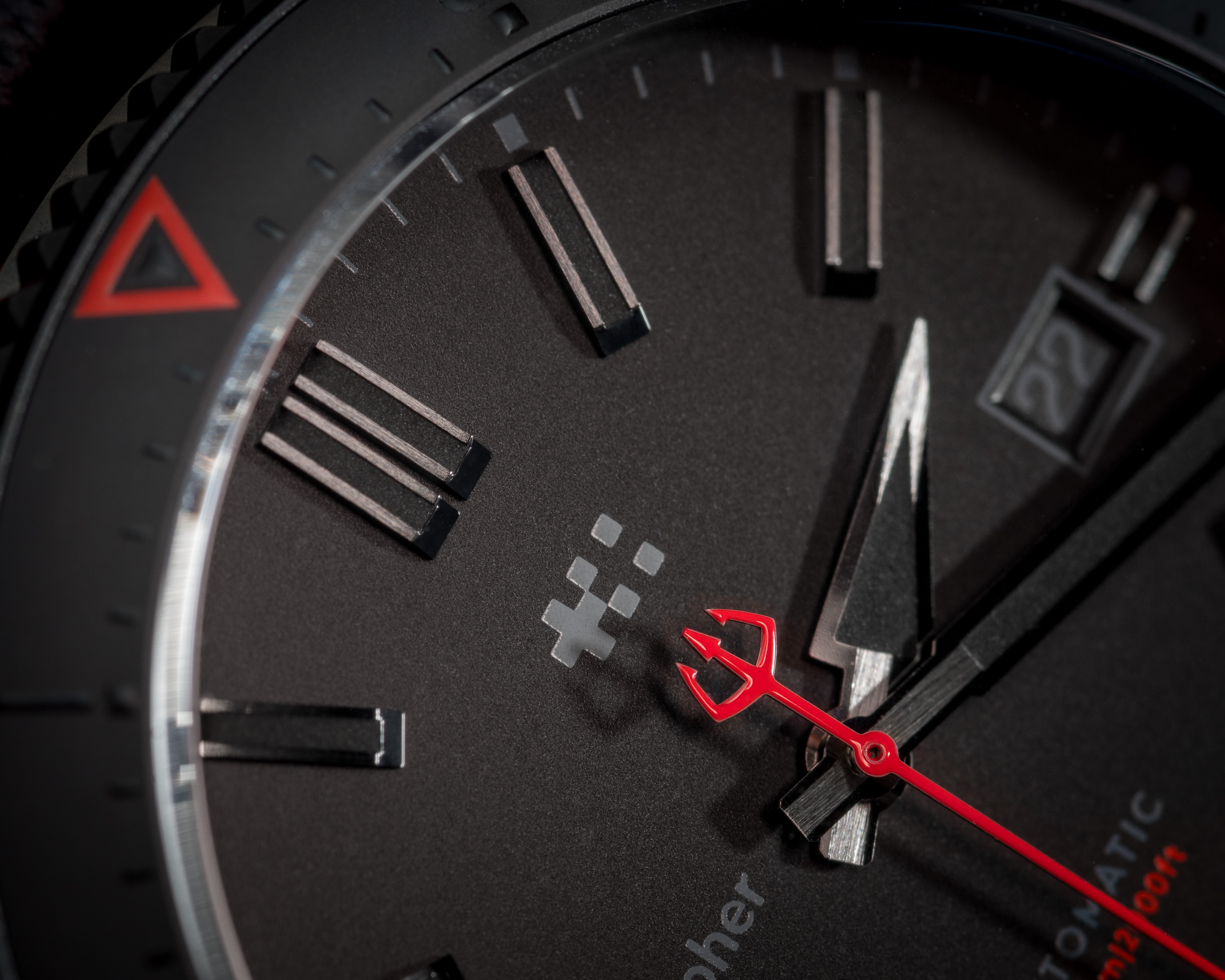 macro photography of the Christopher Ward C60 Abyss automatic watch.